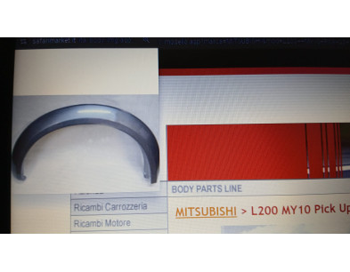 NDP07-12001 Parafanghino ant sx Mitsubishi L200 - Originale