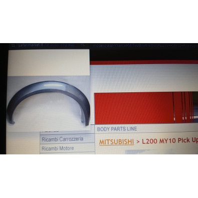 NDP07-12001 Parafanghino ant sx Mitsubishi L200 - Originale