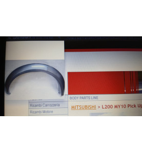 NDP07-12001 Parafanghino ant sx Mitsubishi L200 - Originale