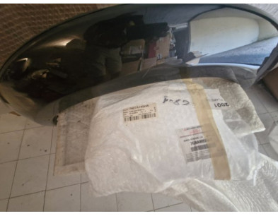 NDP07-12001 Parafanghino ant sx Mitsubishi L200 - Originale