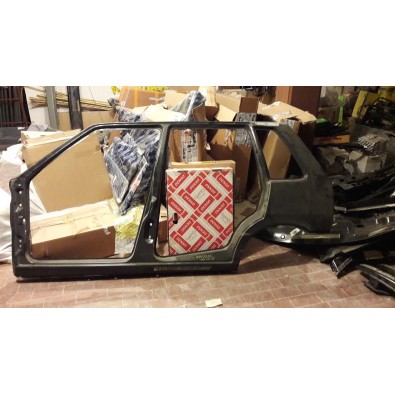 FIANCATA SX FIAT UNO 5P - OE 7727269