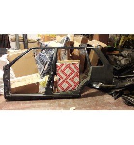 FIANCATA SX FIAT UNO 5P - OE 7727269