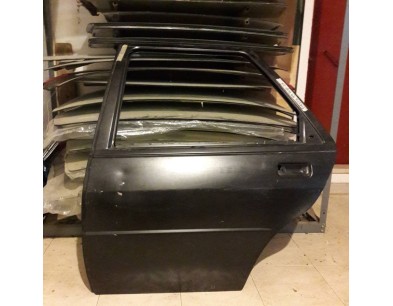 Porta posteriore sx Ford Fiesta 89 - Rear left door Ford Fiesta 89 - Leggera ammaccatura