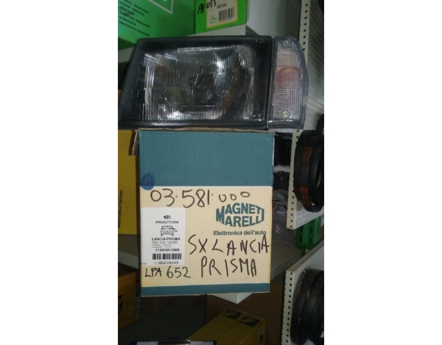 Faro fanale proiettore ant sx Lancia Prisma 85-86 - Marelli LPA652 - OE 82410799 - Left headlight Lancia Prisma 85-86